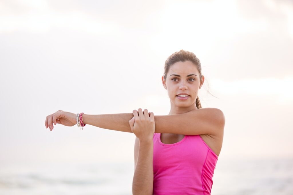 Woman stretching getting ready to workout